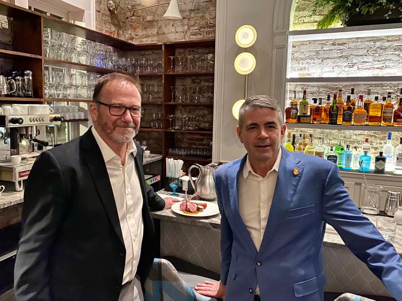 Preston Snyder (left) stands with Michael McNeill, the master sommelier who developed the wine program for the Dining Room, the fine-dining restaurant that Snyder opened this year in Madison. Courtesy of Mad Hospitality