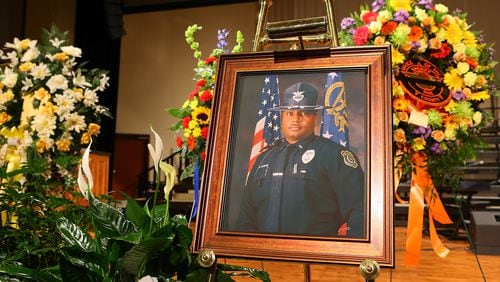 A portrait sits on the stage for the home going service for Griffin police officer Kevin “Shogun” Dorian Jordan, 43, who tragically died in the line of duty at the Oak Hill Baptist Church on Monday, June 9, 2014, in Williamson. CURTIS COMPTON / CCOMPTON@AJC.COM