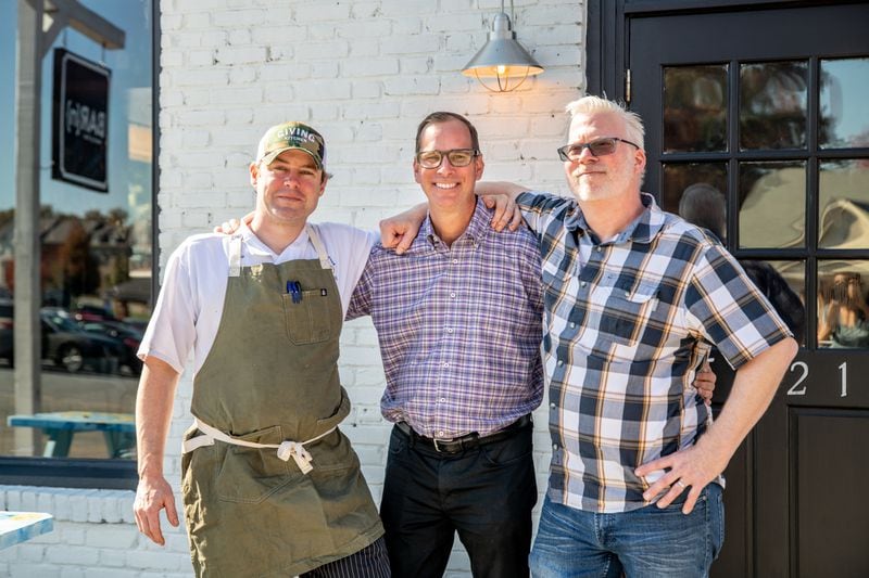 The Bar (n) Booze (n) Bites team includes (from left to right) chef Nick Leahy, David Abes and Phil Handley. (Mia Yakel for The Atlanta Journal-Constitution)