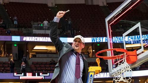 Brian Burg cuts down the nets as an assistant coach at Texas Tech in the 2019 NCAA tournament. (Photo courtesy Texas Tech/Norvelle Kennedy)