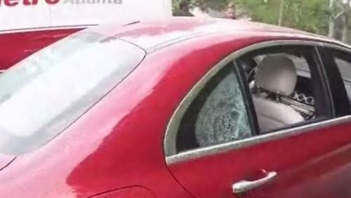 This Mercedes-Benz apparently was damaged Friday, not Monday during a shooting on Cobb Parkway, officials determined. (Credit: Channel 2 Action News)