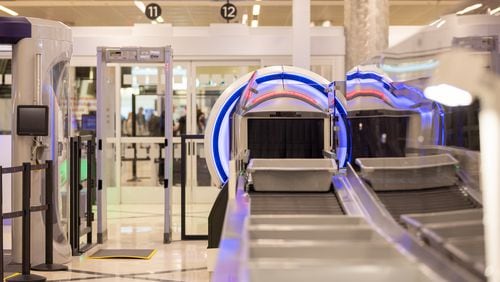 A view of one of the new scanning machines at the domestic terminal at Hartsfield-Jackson in Atlanta on Thursday, December 14, 2023. (Arvin Temkar / arvin.temkar@ajc.com)
