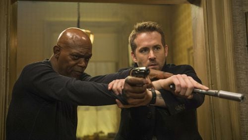 Samuel L. Jackson, left, and Ryan Reynolds star in “The Hitman’s Bodyguard.” Contributed by Jack English/Lionsgate via AP