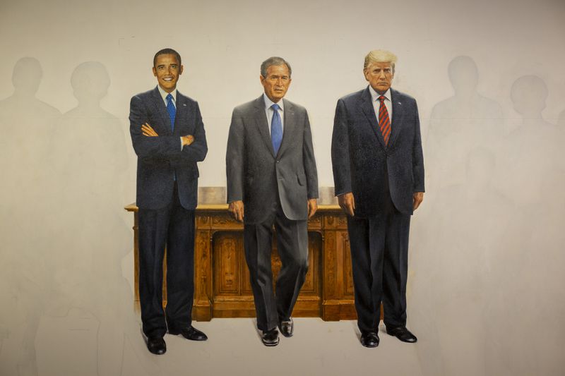 After the inauguration Rossin will update this canvas, which is devoted to the presidents of the 21st century. Somewhere down the road he hopes to find a successor who will complete this task, adding the presidents from the second half of the century after he's gone. (Rebecca Wright for the Atlanta Journal-Constitution)
