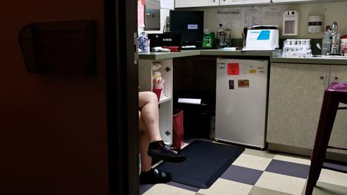 A patient sits in a lab room at Feminist Women's Health Center in Brookhaven on Wednesday, Aug. 17, 2022. (Natrice Miller/natrice.miller@ajc.com)
