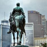 An equestrian statue of John Brown Gordon on the Capitol grounds stands watch over the downtown Atlanta skyline. (Chris Hunt / Special to the AJC) [Captions by PETE CORSON / pcorson@ajc.com]
