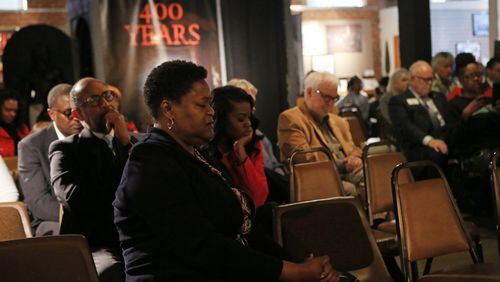 Felicia Moore, president of the Atlanta City Council, prays during a vigil for U.S. Rep. John Lewis on Sunday, January 12, 2020, at the APEX Museum in Atlanta. Lewis has been diagnosed with stage 4 pancreatic cancer. (Photo: Christina Matacotta/Special to the AJC)