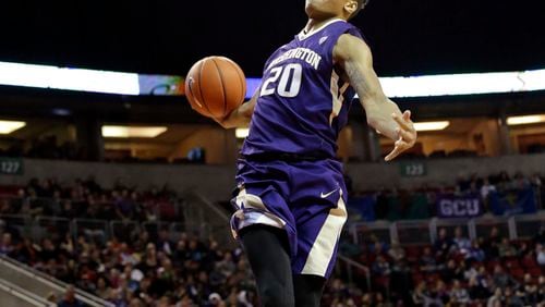 In this Dec. 22, 2016, file photo, Washington’s Markelle Fultz winds-up to dunk against Seattle in an NCAA college basketball game, in Seattle. Fultz is the likely No. 1 pick in the NBA Draft on Thursday night, June 22. (AP Photo/Elaine Thompson, File)