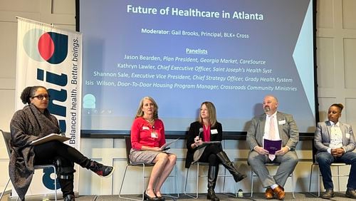 The Atlanta Regional Collaborative for Health Improvement hosted an event Friday with health care leaders discussing the future of health care in Atlanta. From left to right is moderator Gail Brooks, Kathryn Lawler, Saint Joseph’s Health System's CEO; Shannon Sale, executive vice president of the Grady Health System; Jason Bearden of CareSource and community health worker Isis Wilson. (Staff photo by Donovan Thomas)