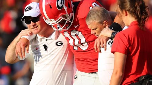 September 2, 2017 Athens: Georgia quarterback Jacob Eason is injured and leaves the game during the first quarter against Appalachian State in a NCAA college football game on Saturday, September 2, 2017, in Athens.    Curtis Compton/ccompton@ajc.com