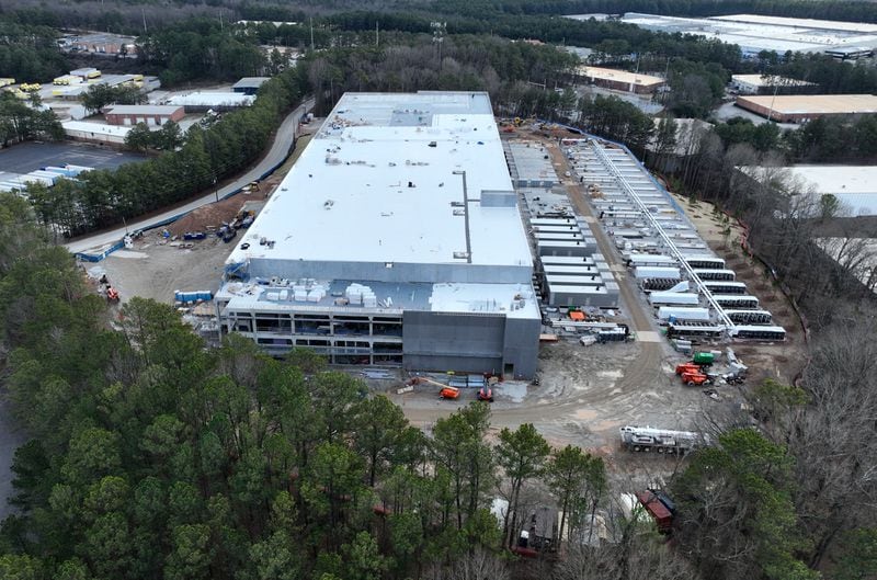 An aerial photograph shows the construction site of a DataBank facility in Atlanta. A push is underway in the General Assembly to suspend the tax break the state provides for data centers. One reason is that while they are massive in size, they don't employ that many people. (Hyosub Shin / Hyosub.Shin@ajc.com)