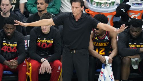Atlanta Hawks head coach Quin Snyder calls to his players while facing the Boston Celtics during Game 2 in the first round of the NBA basketball playoffs, Tuesday, April 18, 2023, in Boston. (AP Photo/Charles Krupa)