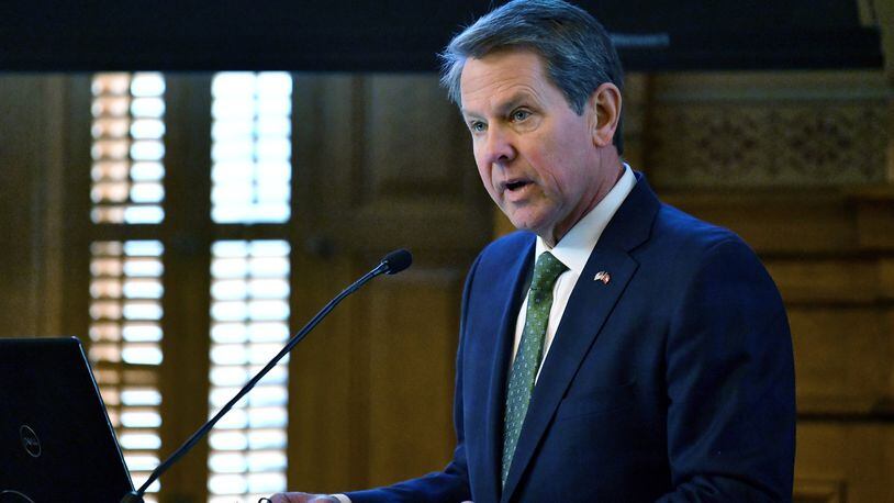 Georgia Gov. Brian Kemp signed a $30.2 billion midyear budget on Wednesday that includes raises for state and university workers, raises for teachers and refunds for taxpayers. (Hyosub Shin / Hyosub.Shin@ajc.com)