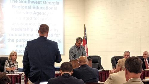 May 10, 2019, Camilla, Ga. — Gov. Brian Kemp takes questions during his visit to the Southwest Georgia Regional Educational Service Agency in Camilla. Seated, immediately to his left, is state school Superintendent Richard Woods.