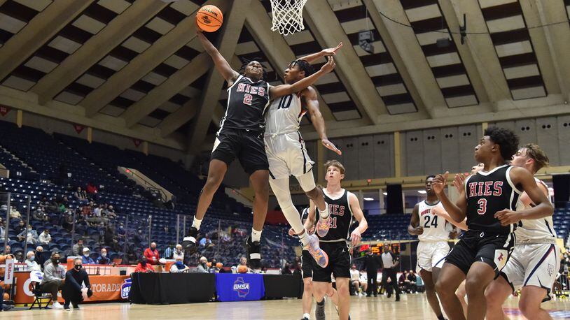 March 10, 2021 Macon - Holy Innocents' Garrison Powell (2) goes up for a shot against Mt. Pisgah's Jojo Peterson (10) during the 2021 GHSA State Basketball Class A Private Championship game at the Macon Centreplex in Macon on Wednesday, March 10, 2021. Mt. Pisgah won 43-41 over Holy Innocents. (Hyosub Shin / Hyosub.Shin@ajc.com)