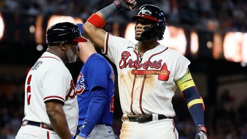 Braves right fielder Ronald Acuña Jr. reacts after hitting a single during the eighth inning against the Chicago Cubs at Truist Park on Monday, Sep. 27, 2023, in Atlanta. Miguel Martinez / miguel.martinezjimenez@ajc.com