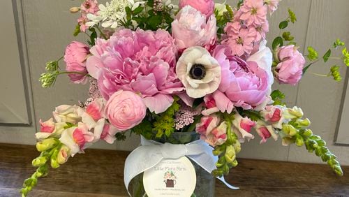 This late-spring arrangement from Little Flora Farm includes peonies, anemones, snapdragons and larkspur. Courtesy of Jill Bowden