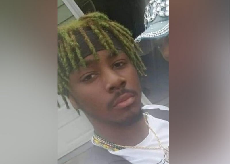 Michael Ezzard Jr., 22, was shot and killed Monday night outside a Smyrna shopping center on Roswell Street.