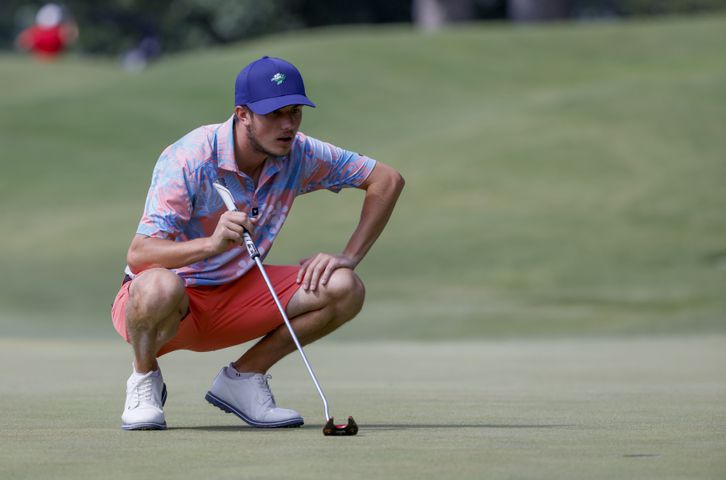 Alex Heffner, Davidson College, who finished fifth and 13 under par, lines up a putt during the final round of the Dogwood Invitational Golf Tournament in Atlanta on Saturday, June 11, 2022.   (Bob Andres for the Atlanta Journal Constitution)