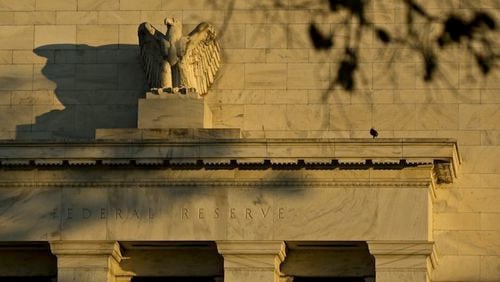 An eagle sculpture stands on the facade of the Marriner S. Eccles Federal Reserve building in Washington on Nov. 18, 2016. MUST CREDIT: Bloomberg photo by Andrew Harrer.
