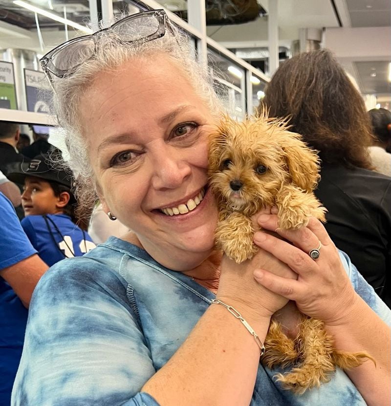 Jennifer Siegel, owner of Bosley's Place, with SweetPea, the smallest participant ever on Puppy Bowl. CONTRIBUTED
