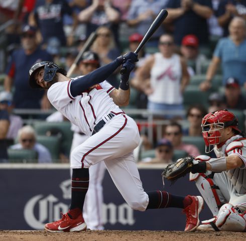 Atlanta Braves' Dansby Swanson strikes out to end the fourth inning of game one of the baseball playoff series between the Braves and the Phillies at Truist Park in Atlanta on Tuesday, October 11, 2022. (Jason Getz / Jason.Getz@ajc.com)