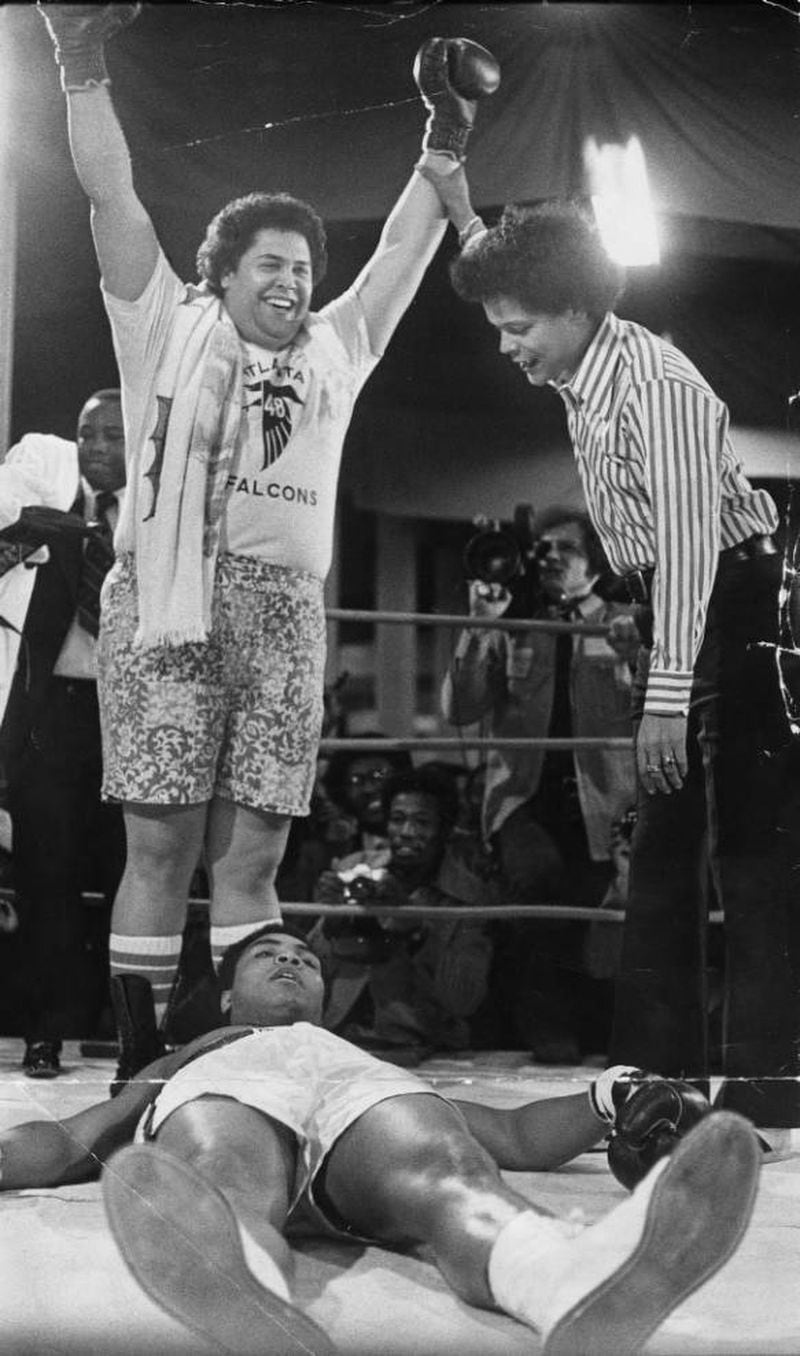  Atlanta Mayor Maynard Jackson "knocked out" Muhammad Ali in 1975, with then Georgia state Sen. Julian Bond officiating. AJC archives photo/Billy Downs