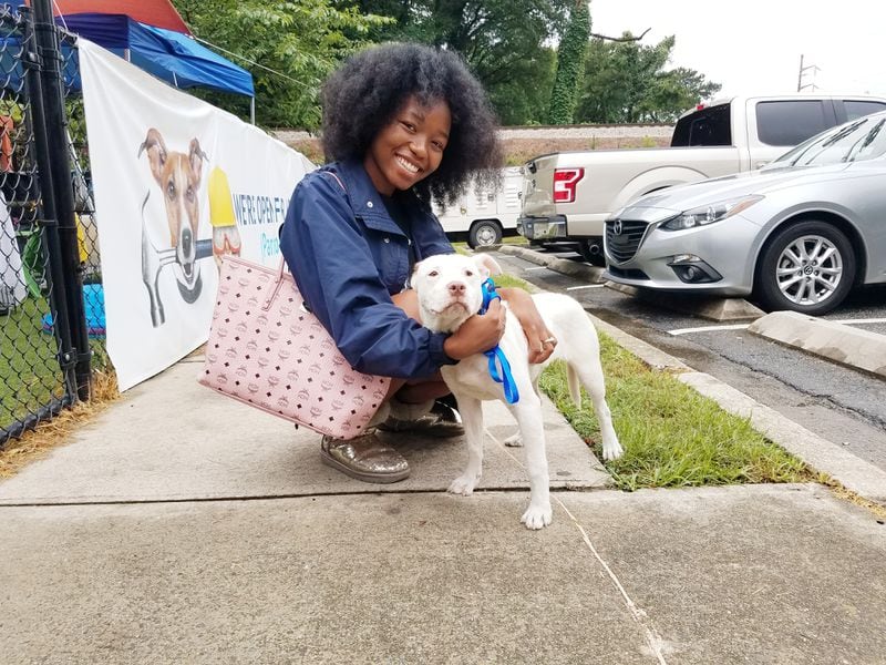 Anna and her new owner after being adopted. (Courtesy of LifeLine Animal Project)