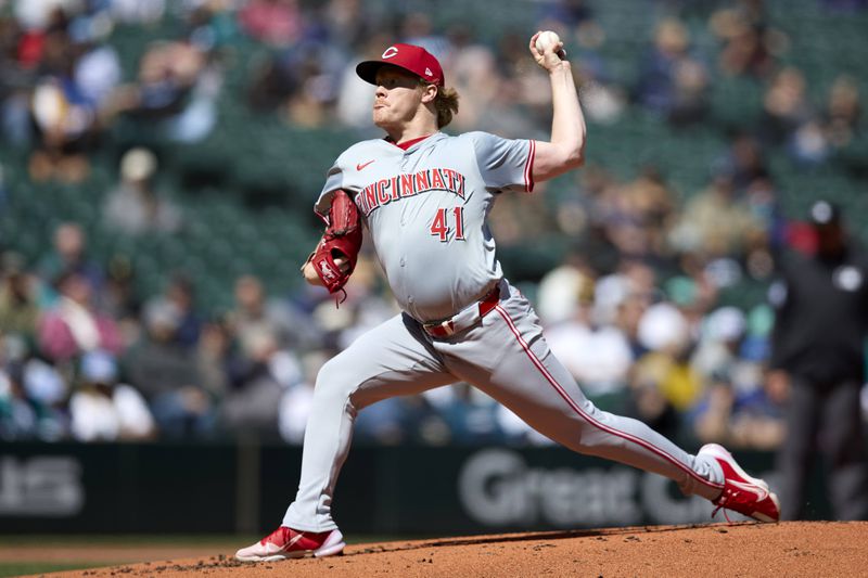 Cincinnati Reds pitcher Andrew Abbott throws to a Seattle Mariners batter during the first inning of a baseball game, Wednesday, April 17, 2024, in Seattle. (AP Photo/John Froschauer)