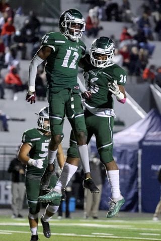 Collins Hill wide receiver Travis Hunter (12) celebrates his touchdown with running back Spenser Anderson (26). JASON GETZ FOR THE ATLANTA JOURNAL-CONSTITUTION