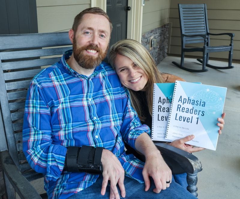 Anna & Ryan Teal on the front porch of their Canton home. Ryan suffered a stroke that left him with Aphasia. He & Anna have developed adult readers to help people with this strengthen their communication skills. PHIL SKINNER FOR THE ATLANTA JOURNAL-CONSTITUTION.