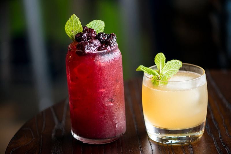 Virgil's Gullah Kitchen and Bar Blackberry Get Tight Up (left) and Virgil's Tea (right) cocktails. (Mia Yakel for The Atlanta Journal-Constitution)