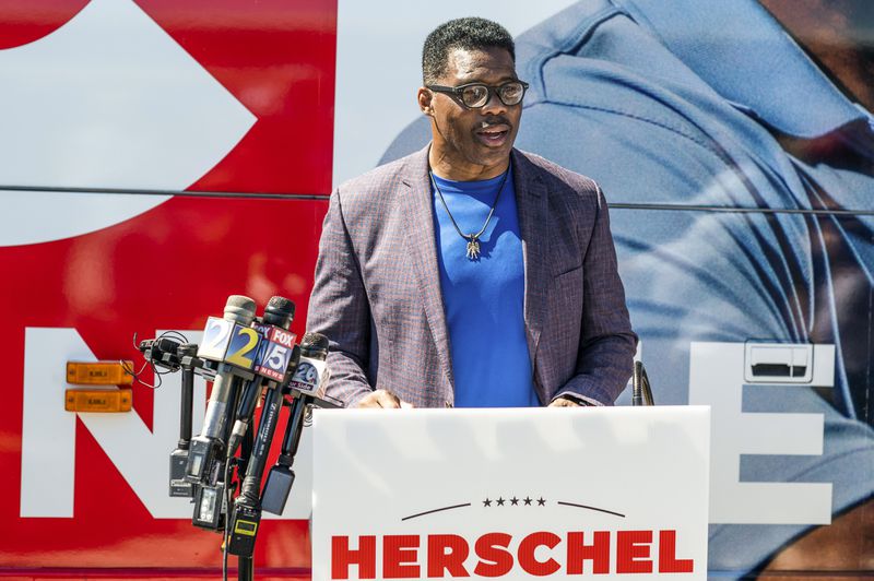 Republican U.S. Senate candidate Herschel Walker, shown speaking Thursday to reporters in Wadley, denied allegations The Daily Beast reported that the anti-abortion candidate paid for a woman's abortion in 2009. (Nicole Buchanan/The New York Times)
