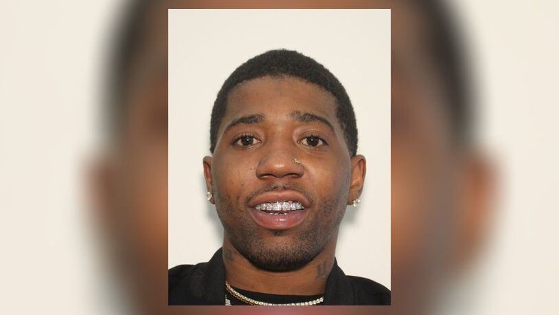 Atlanta rapper YFN Lucci, whose real name is Rayshawn Bennett, is wanted on murder and other charges following a fatal shootout last month in southwest Atlanta, authorities said.