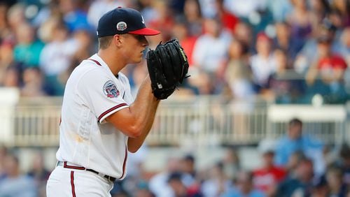 Lucas Sims of the Atlanta Braves makes his MLB debut as he pitches in the first inning against the Los Angeles Dodgers at SunTrust Park on August 1, 2017 in Atlanta, Georgia.