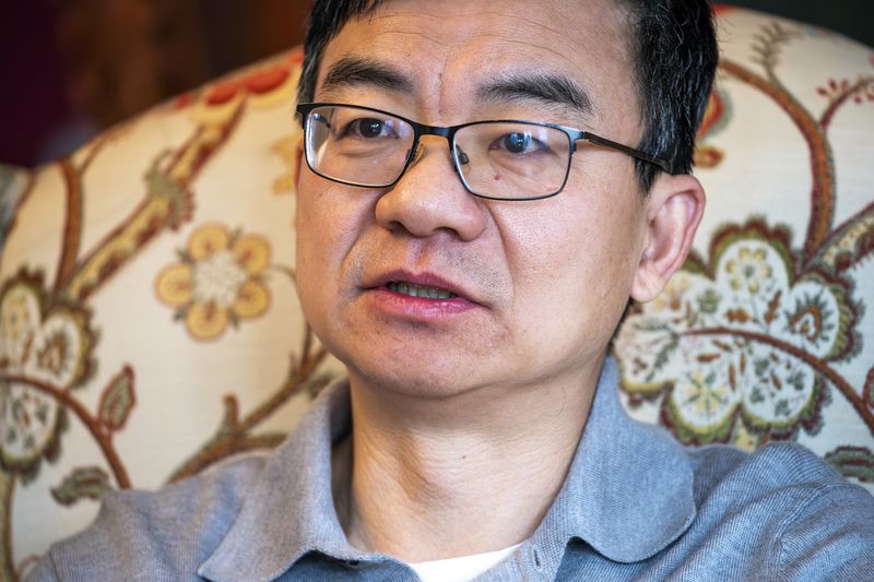 Weihua Yan, a former candidate for legislative district 10 in Nassau County, speaks during an interview at his home, Tuesday, March 26, 2024, in Great Neck, N.Y. A new voting rights law in New York is already having a dramatic effect, with lawsuits in several local communities seeking to reverse decades of voter disenfranchisement that prevents minorities from electing representatives of their choice. (AP Photo/Eduardo Munoz Alvarez)