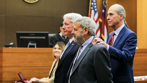 04/13/2018 -- Atlanta, GA - Defense attorney Bruce Harvey gives the jury an eye measure of Claud "Tex" McIver, left, and Don Samuel during the nineteenth day of trial for Tex McIver before Fulton County Chief Judge Robert McBurney, Friday, April 13, 2018. Attorney Bruce Harvey demonstrated the similar physical characteristics of the two men following a question on how accurate a crime scene analysis may have been using defense attorney Don Samuel in place of Tex McIver. ALYSSA POINTER/ALYSSA.POINTER@AJC.COM