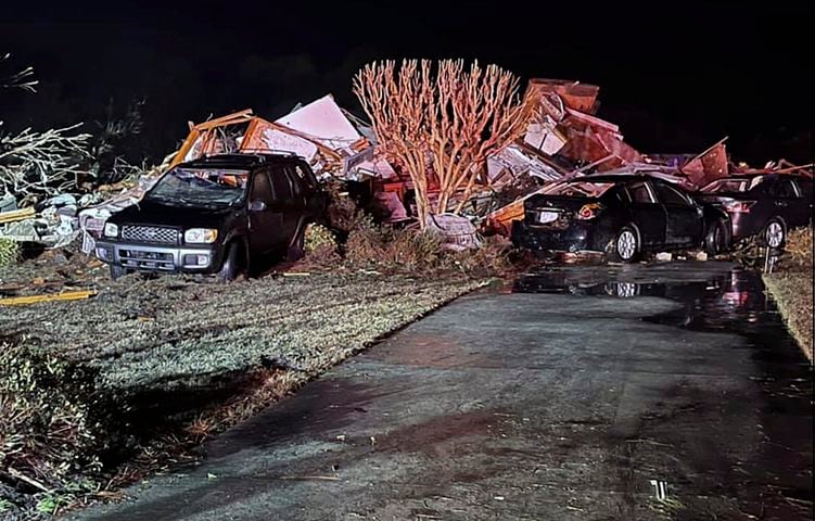 Damaged vehicles and debris left by a tornado early Tuesday, Feb. 16, 2021, in Brunswick County, N.C. (Emily Flax/Brunswick County Sheriff’s Office via The New York Times)