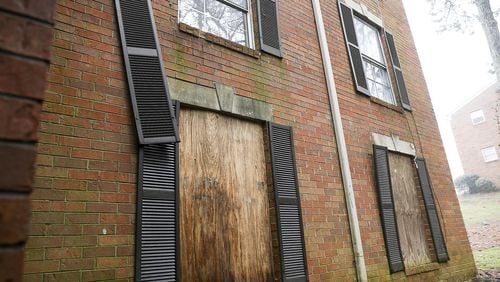 02/21/2019 &mdash; Austell, Georgia &mdash; Apartment windows are boarded up at Parkview Apartments, located at 360 Riverside Parkway, in Austell, Thursday, February 21, 2019. (ALYSSA POINTER/ALYSSA.POINTER@AJC.COM)