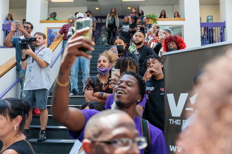 Students watch rapper T.I. give a radio interview at Morris Brown in Atlanta on Monday, August 15, 2022. (Arvin Temkar / arvin.temkar@ajc.com)