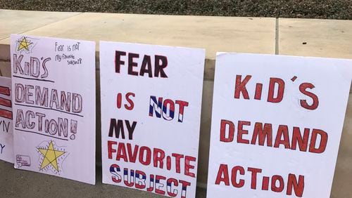 Posters at a gun control rally Wednesday at the Georgia State Capitol feature messages by student activists following last week's school shooting in Parkland, Fla. Vanessa McCray/AJC