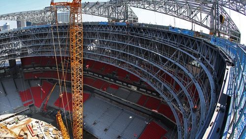 The view from the roof of Mercedes-Benz Stadium earlier this month, looking down on what will become the playing field. Curtis Compton/ccompton@ajc.com