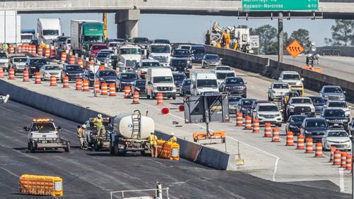Major traffic disruptions are expected at night this week as construction on the new I-285 interchange at Ga. 400 continues. (File photo by John Spink / John.Spink@ajc.com)