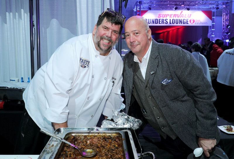 Atlanta restaurateur Kevin Rathbun (left) with Bizarre Foods host and celebrity chef Andrew Zimmern at a Taste of the NFL event held last year in Minnesota in conjunction with the 2018 Super Bowl. Rathbun has been involved with the Taste of the NFL nonprofit for years, serving as the Atlanta Falcons chef representative. GETTY IMAGES