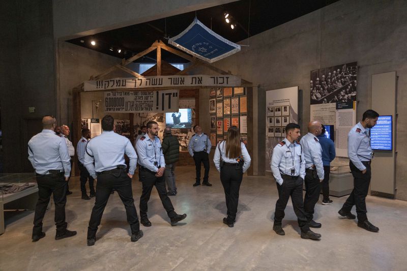 People visit the Yad Vashem Holocaust Memorial Museum in Jerusalem, Sunday, May 5, 2024. The annual Israeli memorial day for the 6 million Jews killed in the Holocaust of World War II begins at sundown Sunday. (AP Photo/Ohad Zwigenberg)