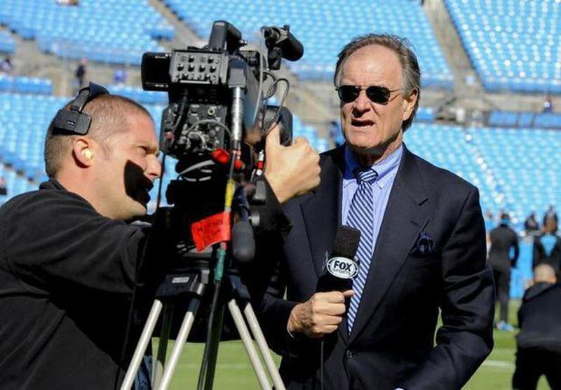 Brian Billick when he was working with Fox. He's now with the NFL Network. (MIKE MCCARN — AP)