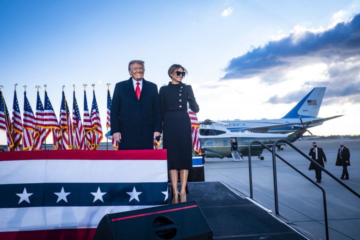 Outgoing President Donald Trump and first lady Melania Trump are cheered by supporters at Joint Base Andrews in Maryland on Wednesday, Jan. 20, 2021, as they prepare to board Air Force One for the last time. (Pete Marovich/The New York Times)