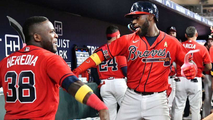Braves outfielder Michael Harris (right) has stepped up to help Jackson, Miss.: He is donating $23,000 to help those affected by the water crisis. (Hyosub Shin / Hyosub.Shin@ajc.com)