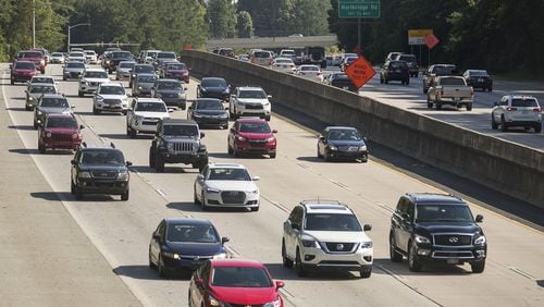 Automobiles travel along Georgia 400, Tuesday, July 23, 2019. Cities along Ga. 400 are talking about petitioning the Georgia Department of Transporation to have a say in how the new highway is being designed as part of the ongoing project.