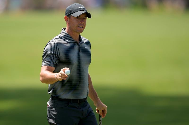 Rory McIlroy, of Northern Ireland, waves after making a putt on the sixth hole during the first round of the RBC Heritage golf tournament, Friday, April 19, 2024, in Hilton Head Island, S.C. (AP Photo/Chris Carlson)